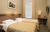 Standard twin with city view, and private facilities (shower)
